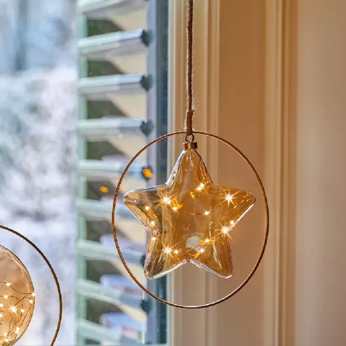 Decorazione da appendere luminosa a pile 15 LED (D26 cm) Stella Invernale Ambra/bianco caldo