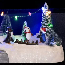 Scena della vita illuminata Aera giochi dei pinguini a pile