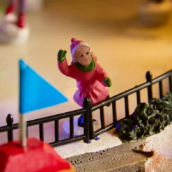 Scena di vita illuminata e musicale Pista di patinaggio esterna