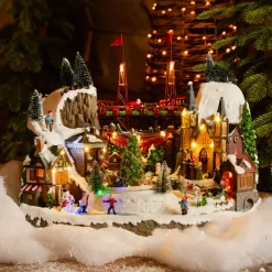 Villaggio di Natale luminoso e musicale, città festosa e Ferrovia